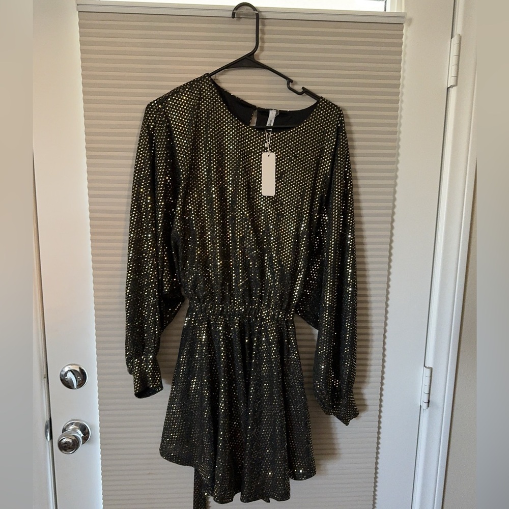 Women black and gold dress